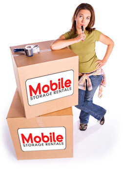 image of a lady with cardboard boxes for moving
